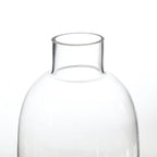 Rounded transparent vase with a narrow neck