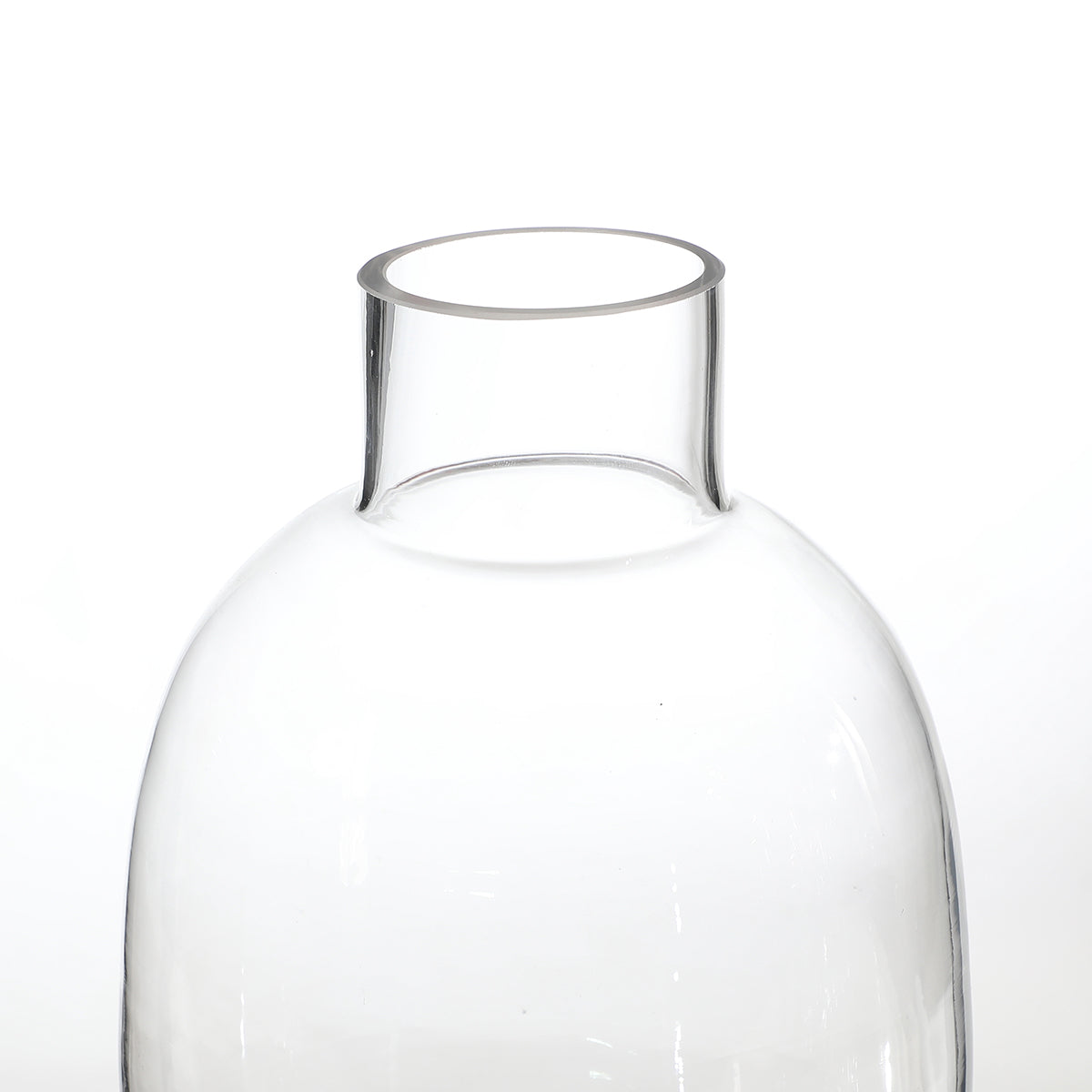 Rounded transparent vase with a narrow neck