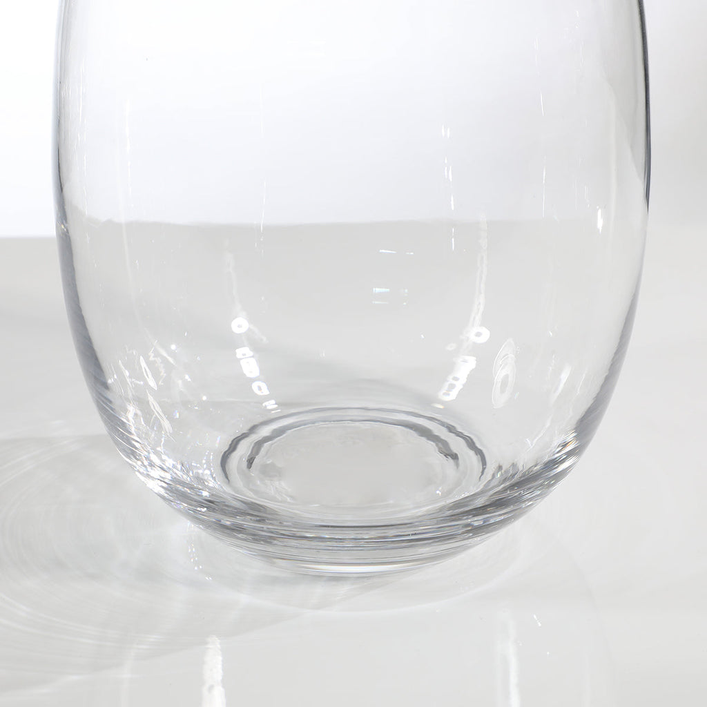 Rounded transparent vase with a narrow neck