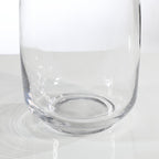 Elongated transparent vase
