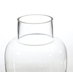 Rounded transparent vase with a wide neck