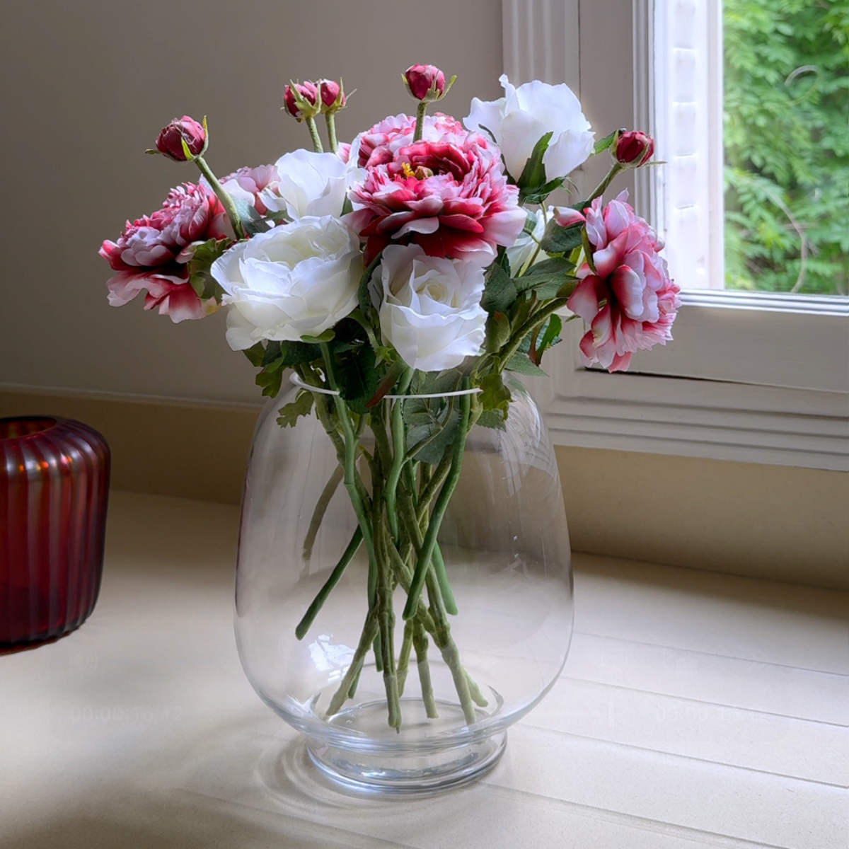 Nora buttercup stem open